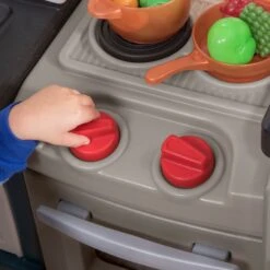 Step2 Modern Metro Play Kitchen With 33 Piece Accessory Play Set -Step2 5e29d42d 4c2c 481d 80f7 5b82082d82cc 3.f3f091638959276f8c1e4adfb1cc8c4a scaled 1